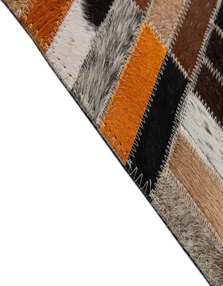Detail image of  5' 1 x 8' Cowhide - Patchwork Rug