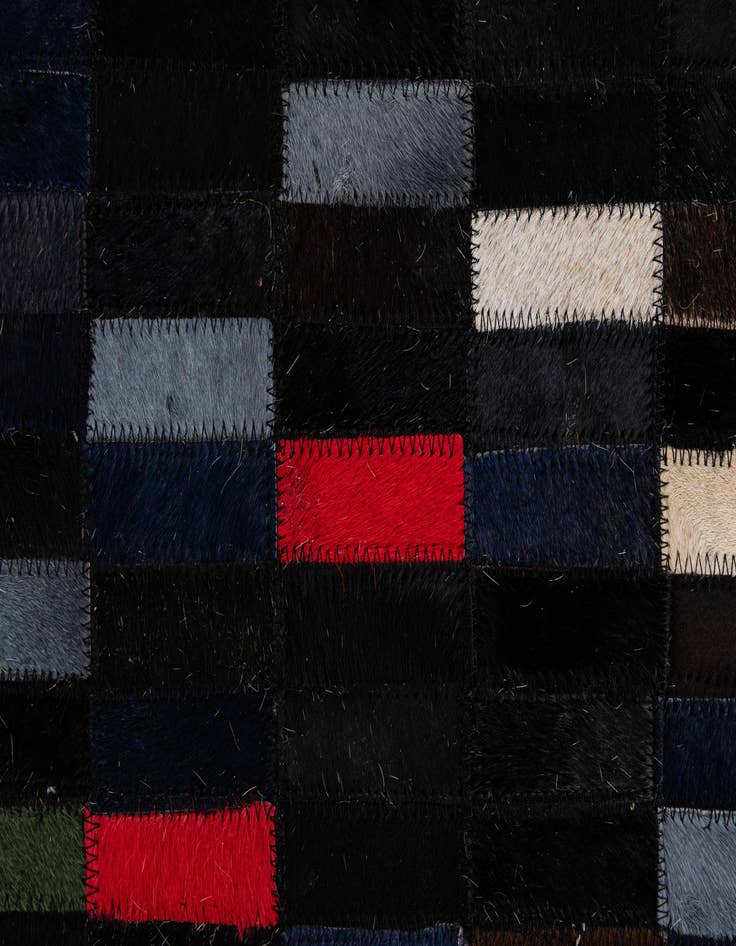 Detail image of  5' 2 x 7' 11 Cowhide - Patchwork Rug