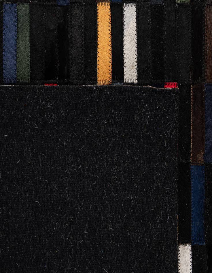 Detail image of  5' 2 x 7' 11 Cowhide - Patchwork Rug