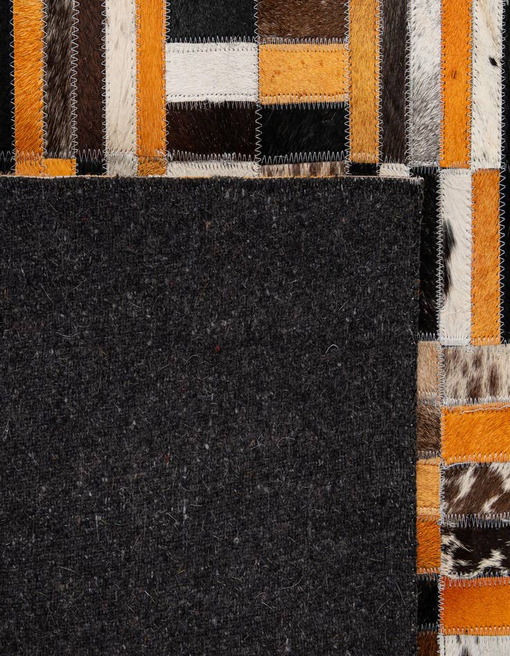 Detail image of  4' 11 x 7' 11 Cowhide - Patchwork Rug