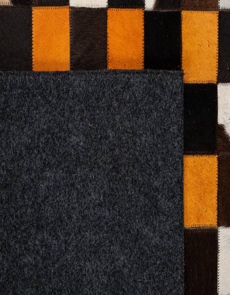 Detail image of  5' 2 x 8' Cowhide - Patchwork Rug