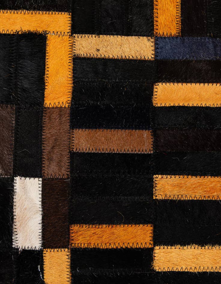 Detail image of  5' 1 x 8' 2 Cowhide - Patchwork Rug