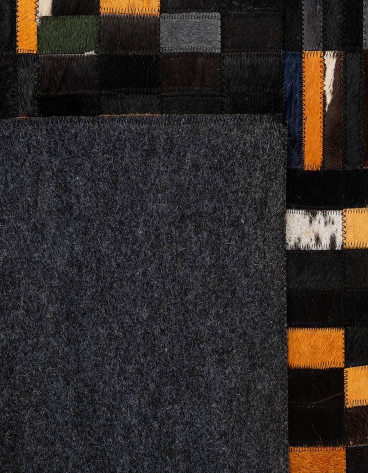 Detail image of  5' 1 x 8' 2 Cowhide - Patchwork Rug