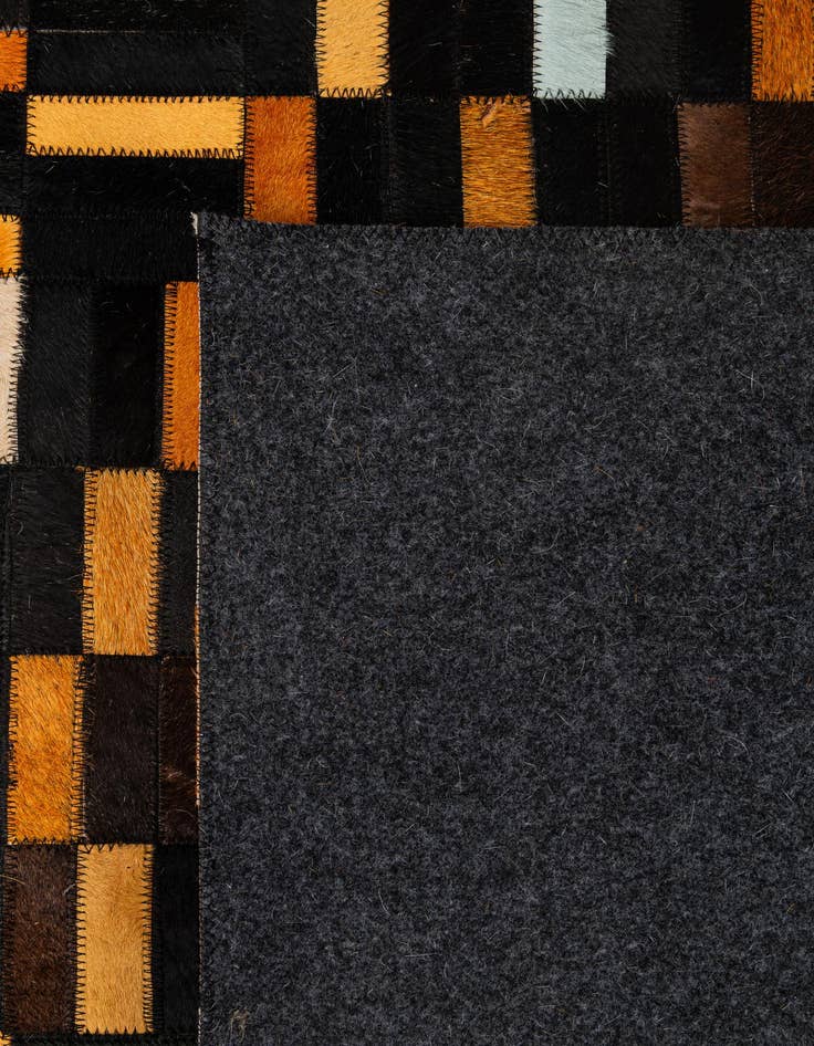 Detail image of  4' 11 x 7' 11 Cowhide - Patchwork Rug