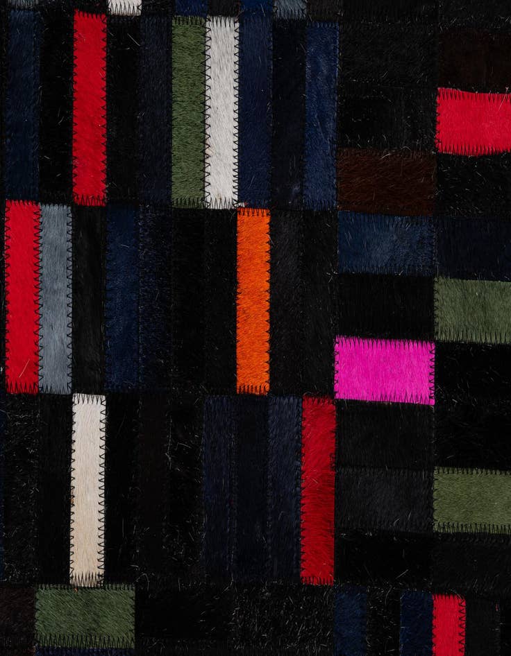 Detail image of  5' 1 x 7' 11 Cowhide - Patchwork Rug