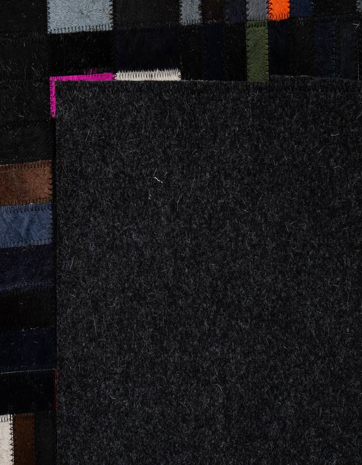 Detail image of  5' 1 x 7' 11 Cowhide - Patchwork Rug