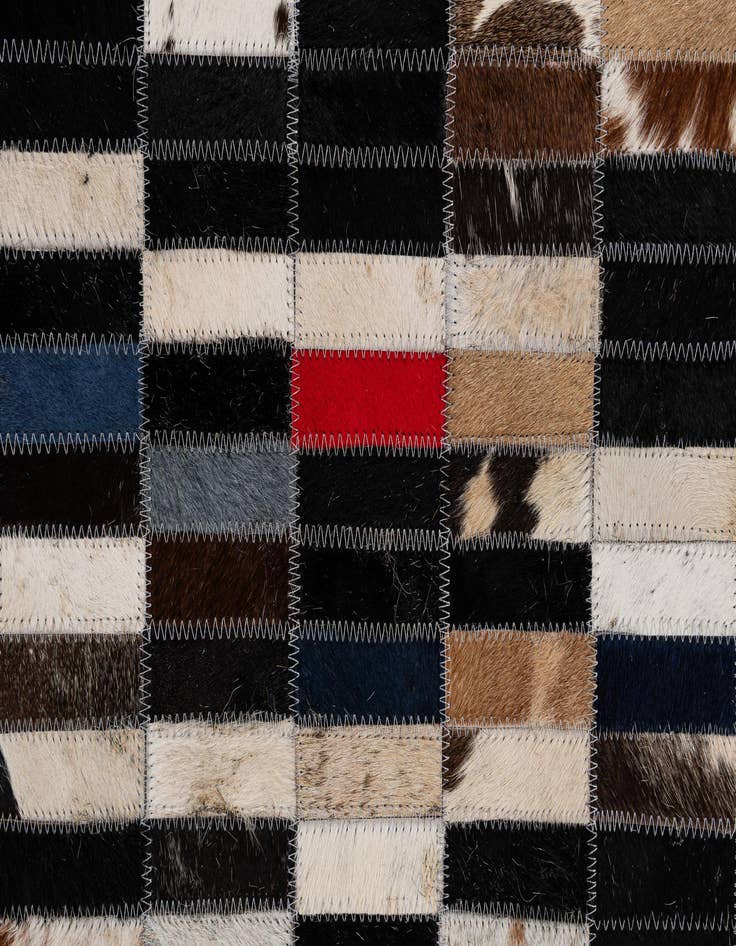 Detail image of  4' 11 x 7' 11 Cowhide - Patchwork Rug
