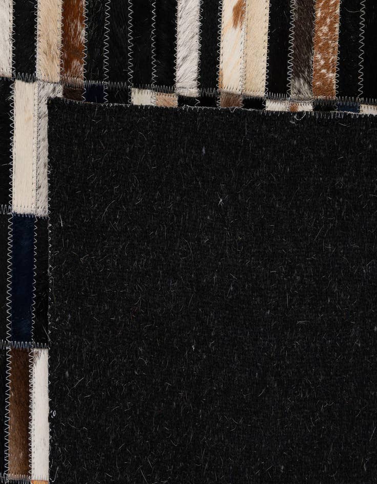 Detail image of  4' 11 x 7' 11 Cowhide - Patchwork Rug