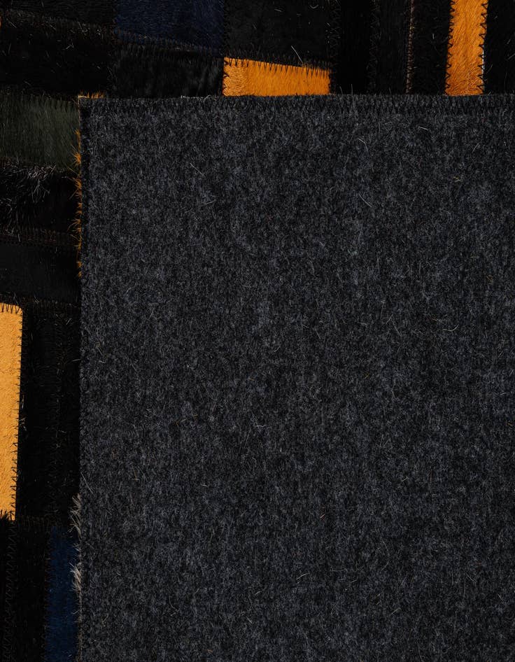 Detail image of  4' 11 x 7' 10 Cowhide - Patchwork Rug