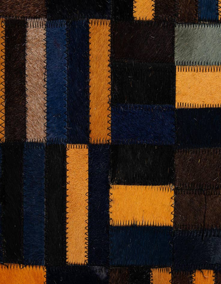 Detail image of  4' 11 x 7' 10 Cowhide - Patchwork Rug