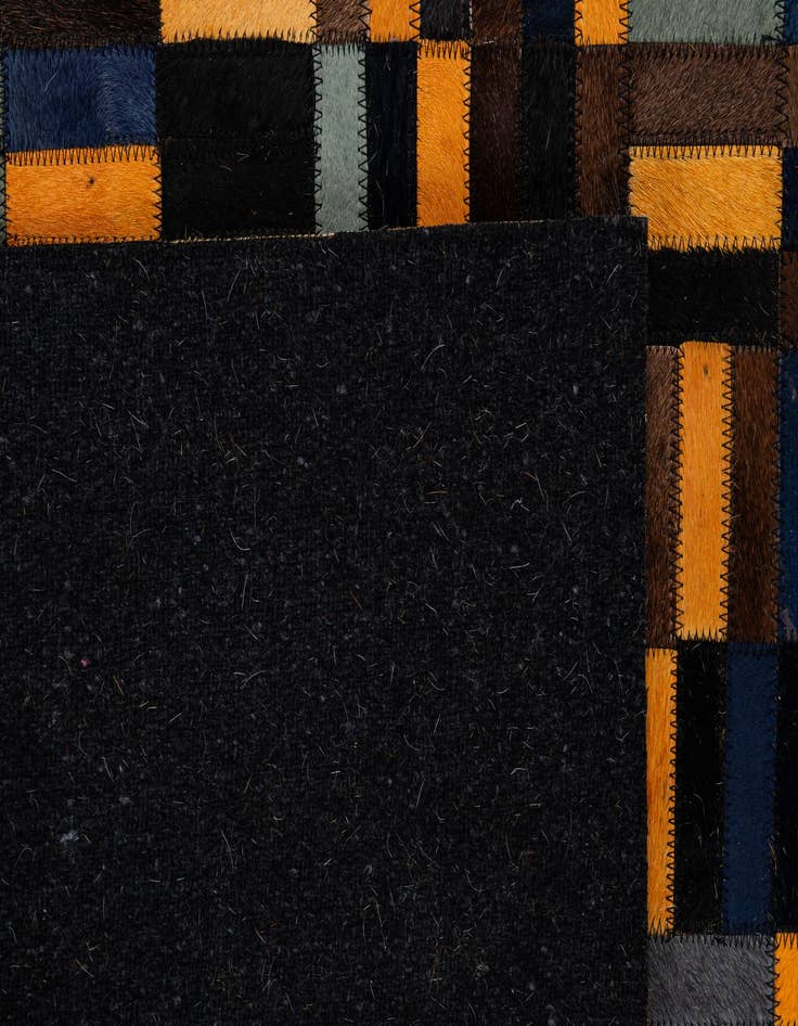 Detail image of  4' 11 x 7' 10 Cowhide - Patchwork Rug