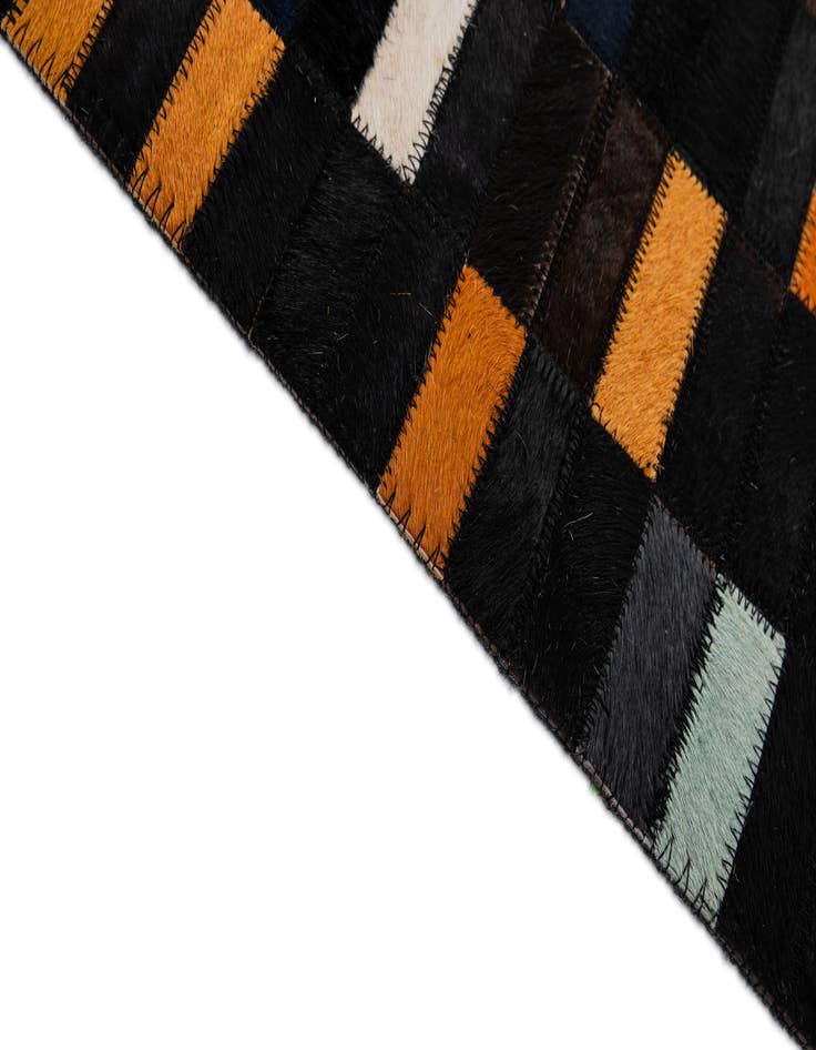 Detail image of  5' 2 x 8' Cowhide - Patchwork Rug