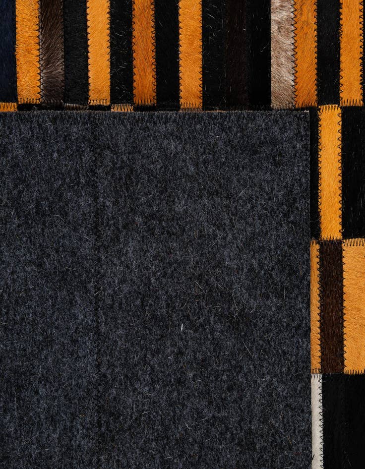 Detail image of  5' 2 x 8' Cowhide - Patchwork Rug