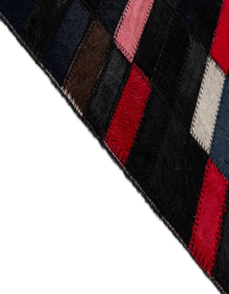 Detail image of  5' 2 x 7' 11 Cowhide - Patchwork Rug