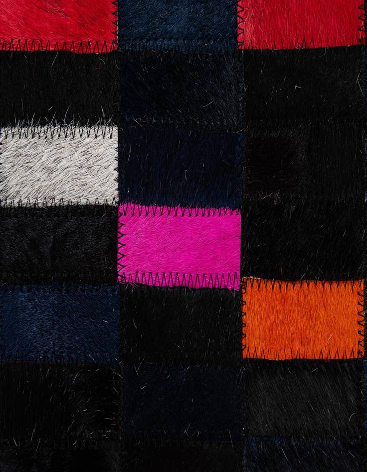 Detail image of  5' 2 x 7' 11 Cowhide - Patchwork Rug