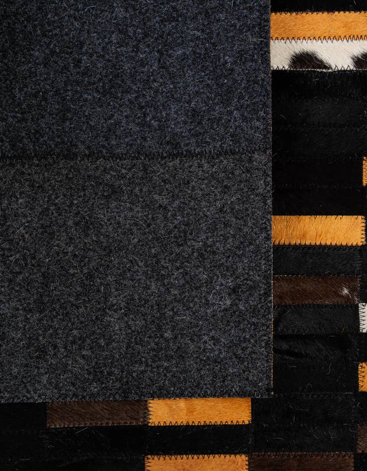 Detail image of  5' 2 x 7' 10 Cowhide - Patchwork Rug