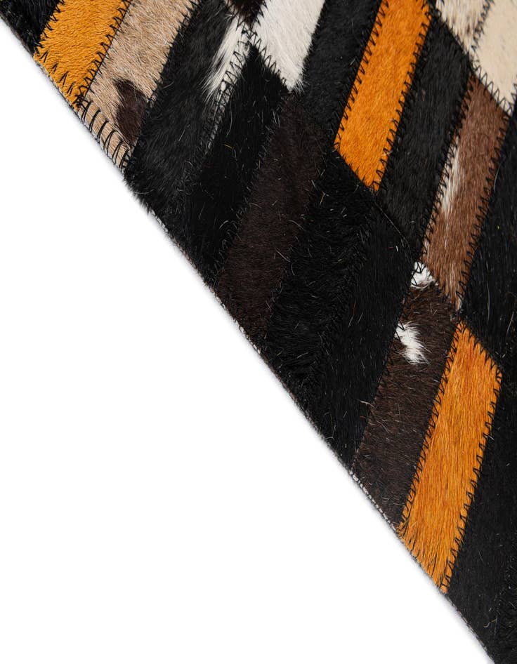 Detail image of  5' 2 x 8' Cowhide - Patchwork Rug