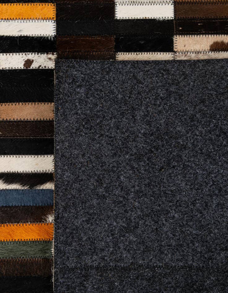 Detail image of  5' 2 x 8' Cowhide - Patchwork Rug
