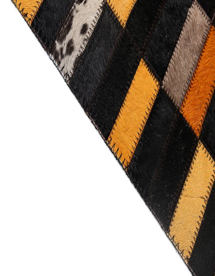 Detail image of  5' 2 x 7' 11 Cowhide - Patchwork Rug