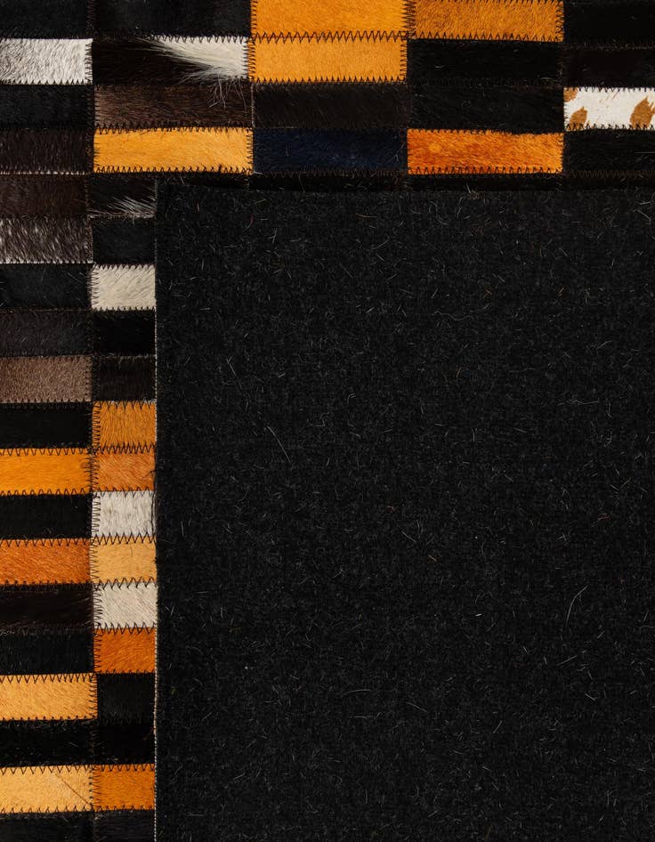 Detail image of  5' 2 x 7' 11 Cowhide - Patchwork Rug