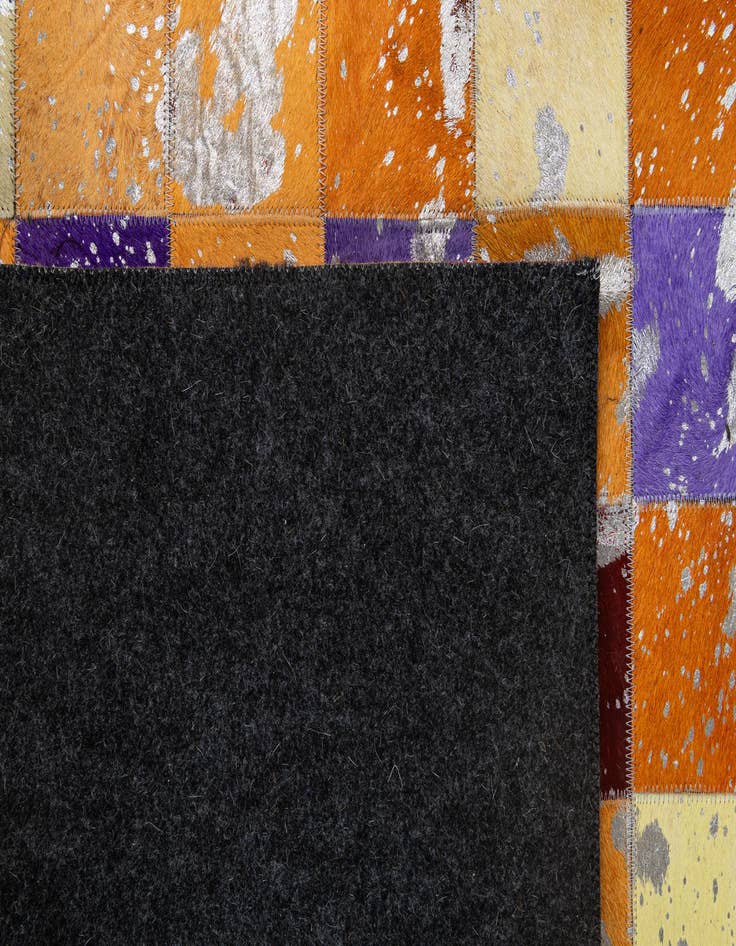 Detail image of  4' 11 x 7' 10 Cowhide - Patchwork Rug
