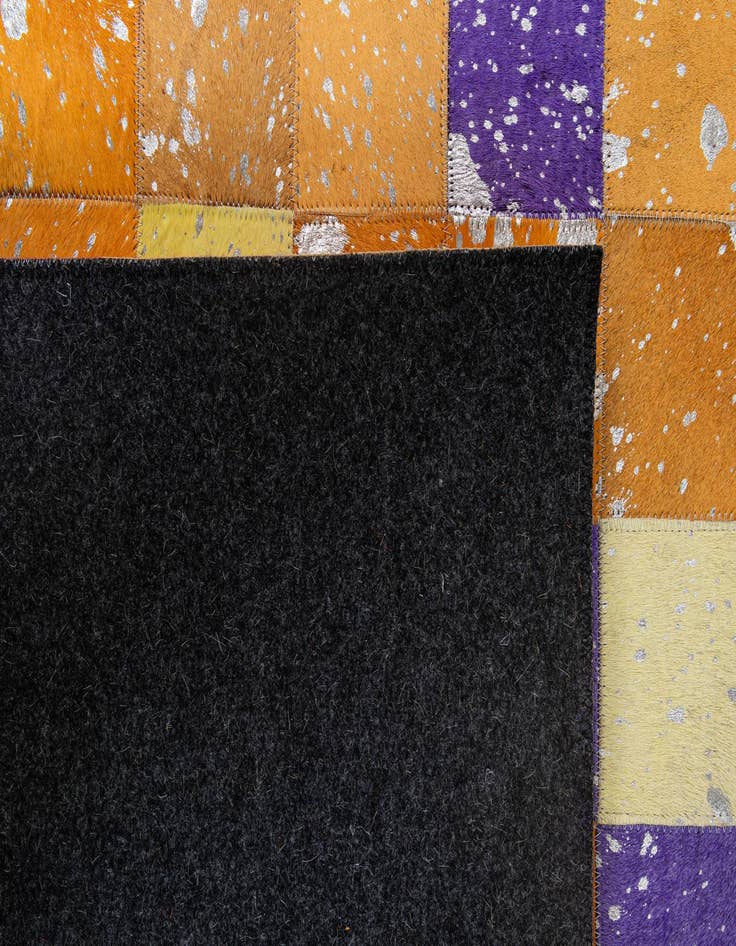 Detail image of  4' 11 x 7' 10 Cowhide - Patchwork Rug