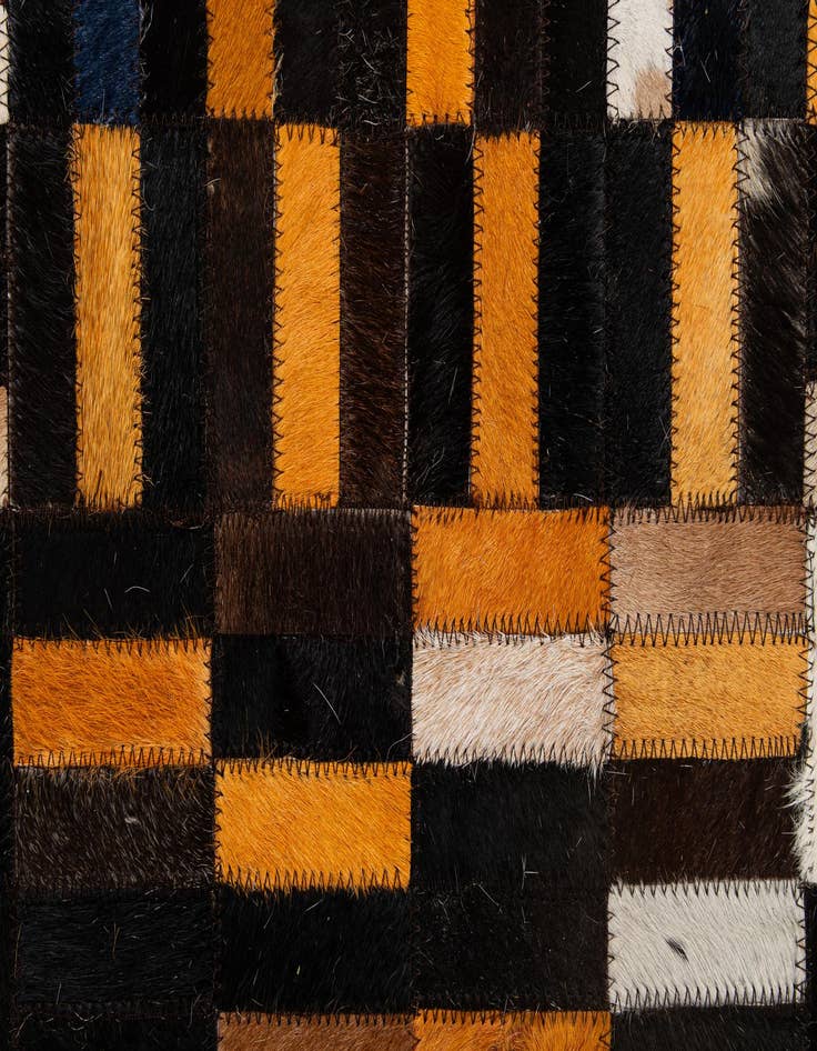 Detail image of  5' x 7' 11 Cowhide - Patchwork Rug