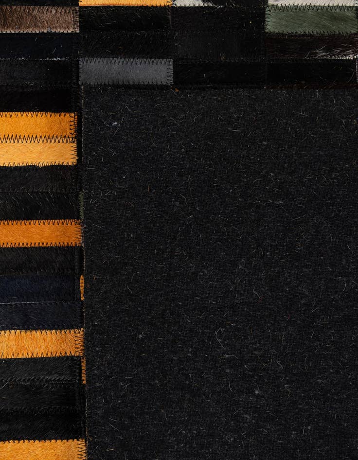 Detail image of  5' 2 x 7' 11 Cowhide - Patchwork Rug