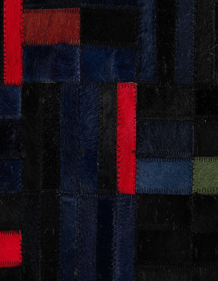 Detail image of  5' 1 x 7' 11 Cowhide - Patchwork Rug