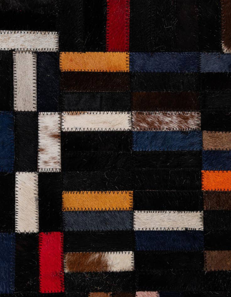 Detail image of  5' 2 x 7' 11 Cowhide - Patchwork Rug