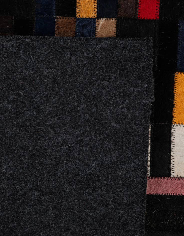 Detail image of  5' 2 x 7' 11 Cowhide - Patchwork Rug