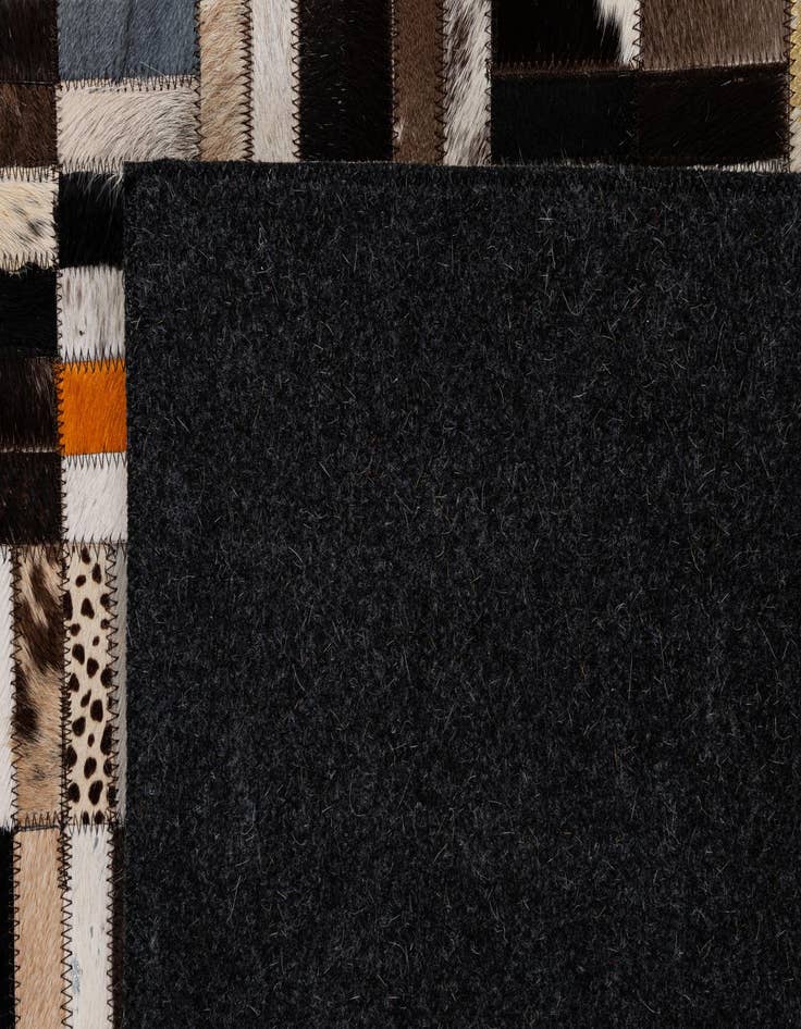Detail image of  5' 2 x 8' Cowhide - Patchwork Rug