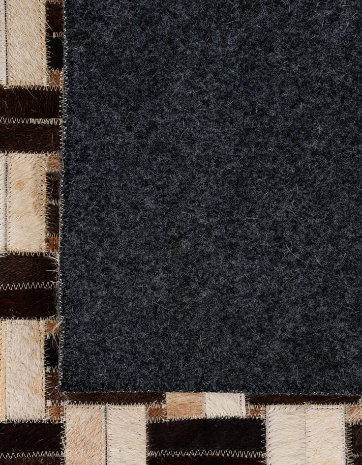 Detail image of  4' 11 x 7' 10 Cowhide - Patchwork Rug
