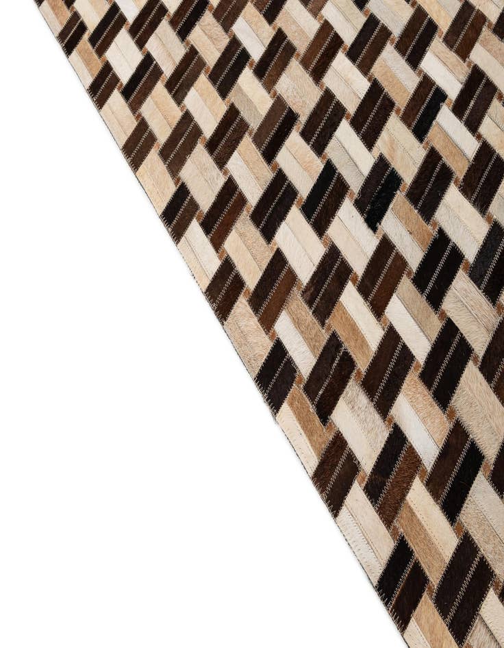 Detail image of  4' 11 x 7' 10 Cowhide - Patchwork Rug