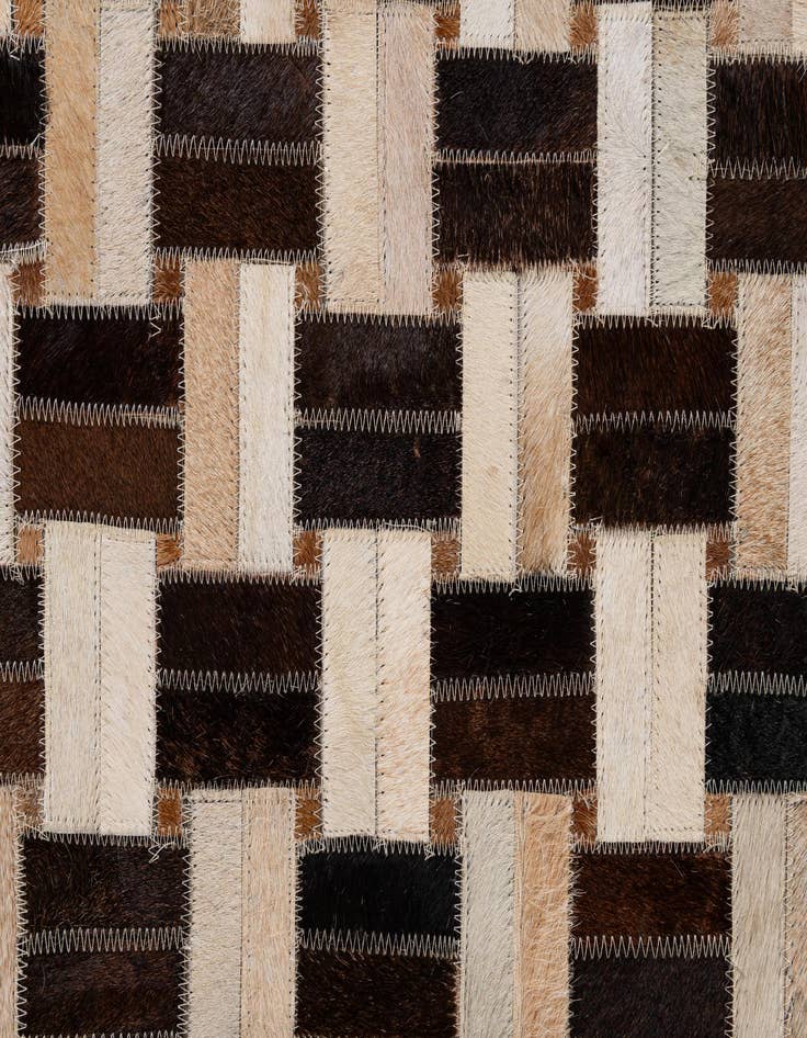 Detail image of  4' 11 x 7' 10 Cowhide - Patchwork Rug