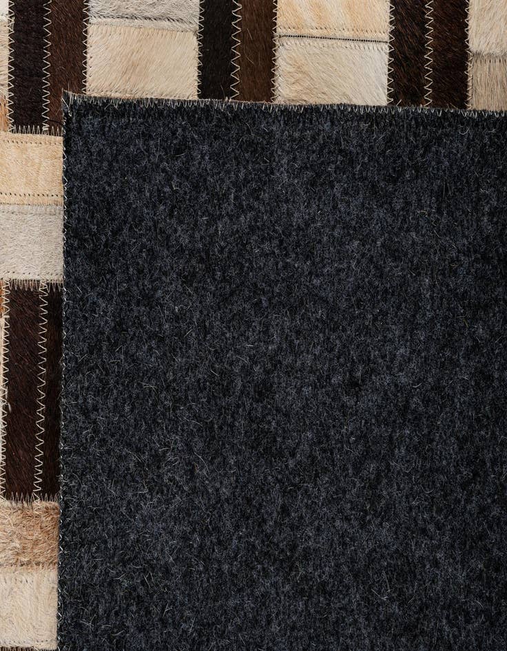 Detail image of  4' 11 x 7' 10 Cowhide - Patchwork Rug