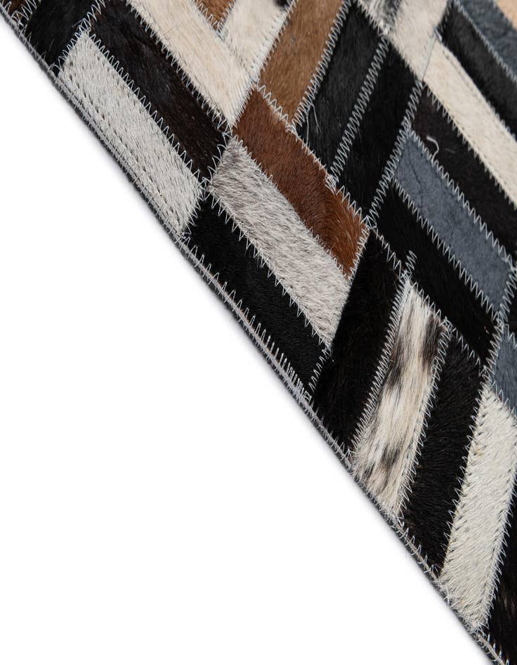 Detail image of  5' 3 x 8' Cowhide - Patchwork Rug
