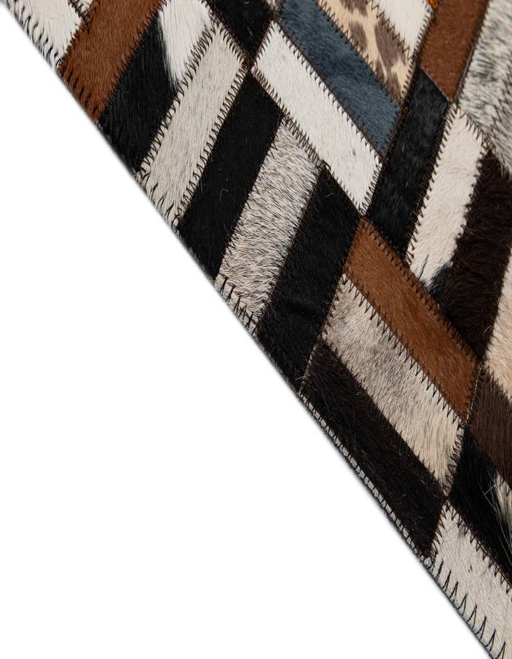 Detail image of  5' 3 x 8' Cowhide - Patchwork Rug