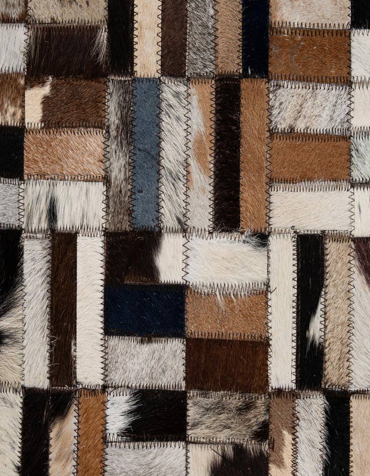 Detail image of  5' 3 x 8' Cowhide - Patchwork Rug