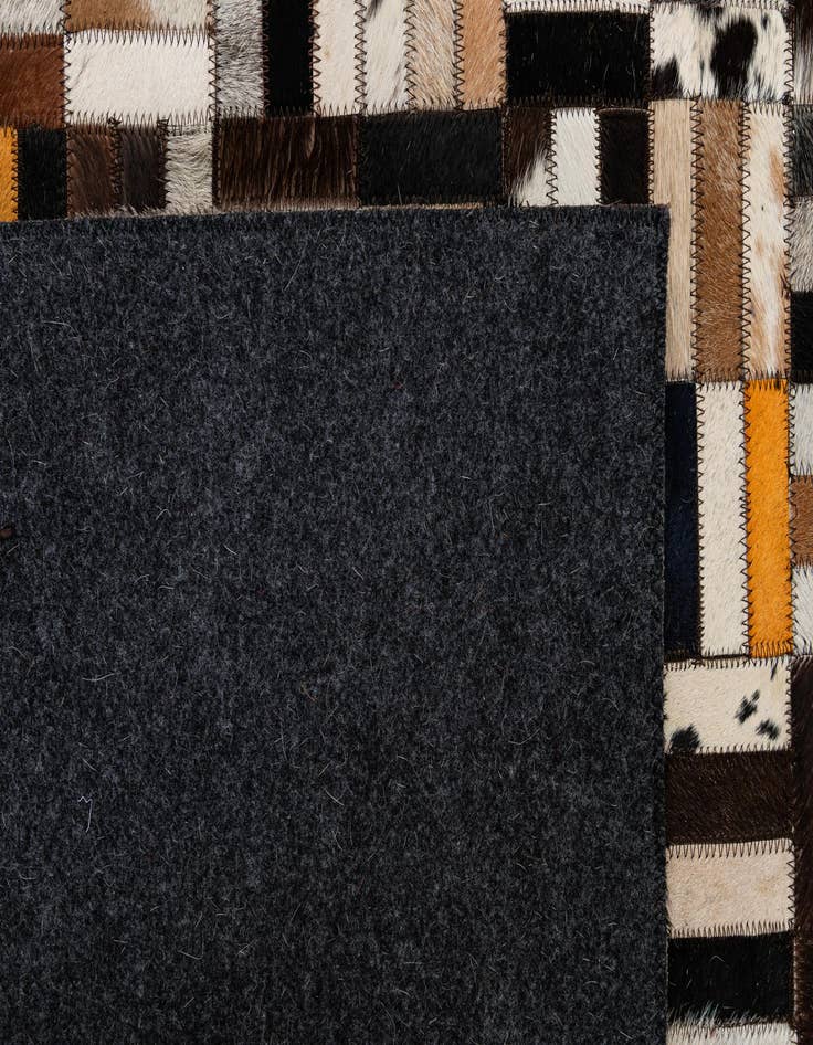 Detail image of  5' 3 x 8' Cowhide - Patchwork Rug