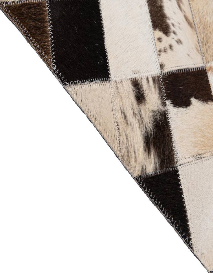 Detail image of  5' 1 x 8' Cowhide - Patchwork Rug