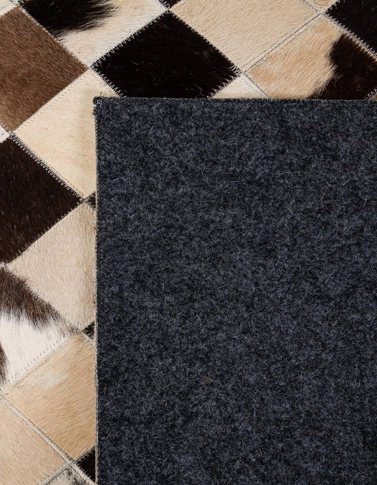 Detail image of  5' 1 x 8' Cowhide - Patchwork Rug