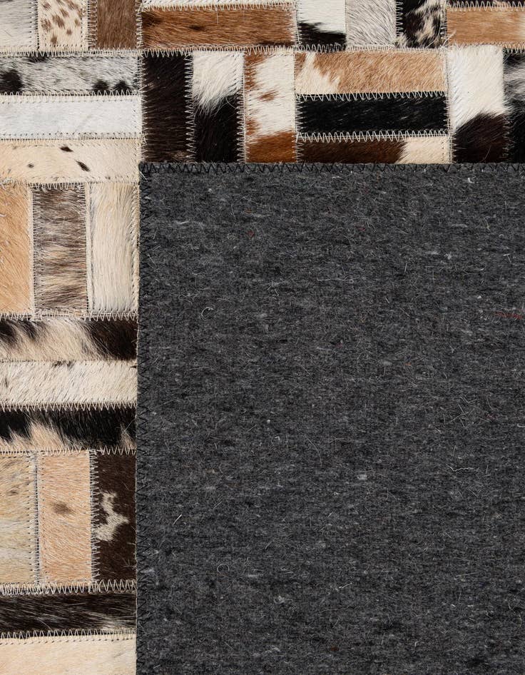 Detail image of  5' 1 x 8' Cowhide - Patchwork Rug