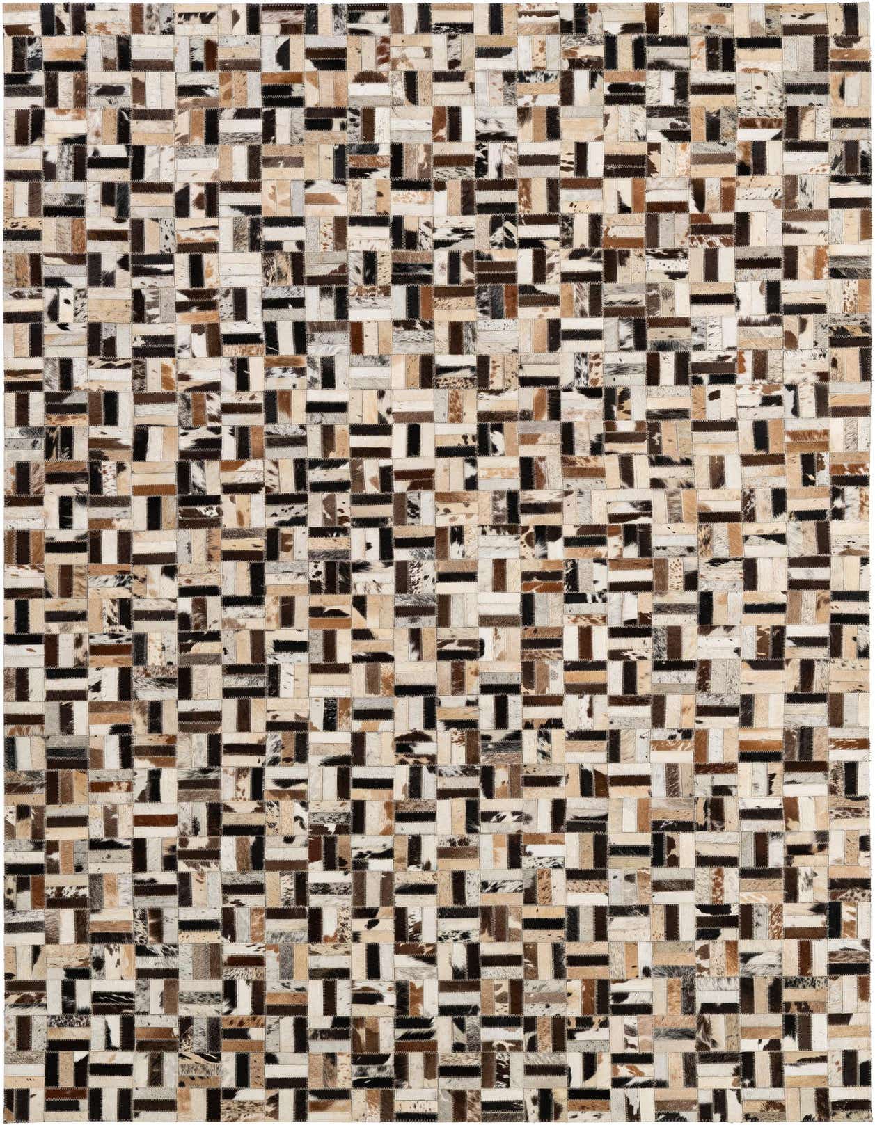 A rectangular 5x8 modern patchwork cowhide rug with multi-colored stripes of natural brown, black, and white tones.