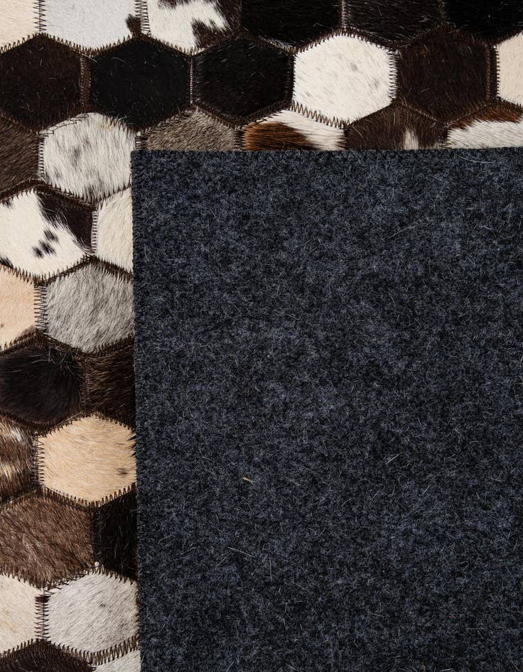 Detail image of  5' 2 x 8' Cowhide - Patchwork Rug