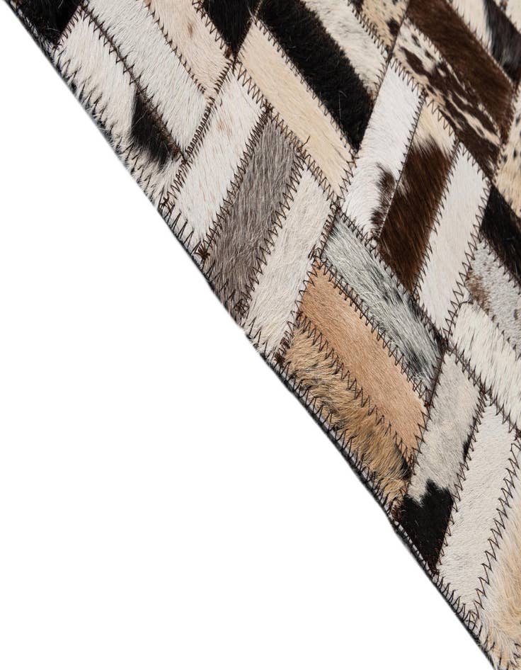 Detail image of  5' x 7' 11 Cowhide - Patchwork Rug