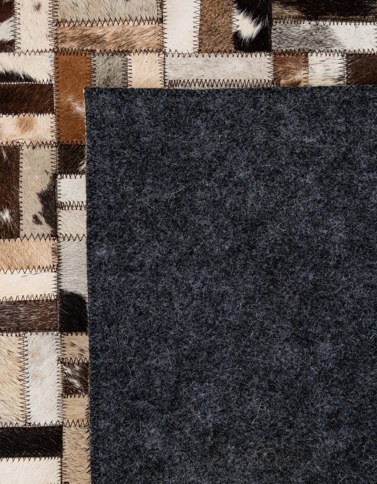 Detail image of  5' x 7' 11 Cowhide - Patchwork Rug