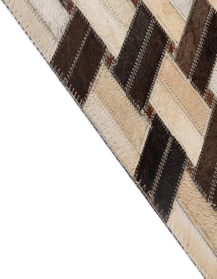 Detail image of  4' 11 x 7' 10 Cowhide - Patchwork Rug