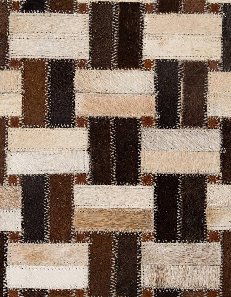 Detail image of  4' 11 x 7' 10 Cowhide - Patchwork Rug