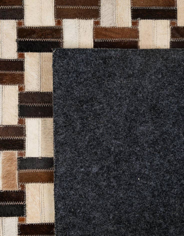 Detail image of  4' 11 x 7' 10 Cowhide - Patchwork Rug
